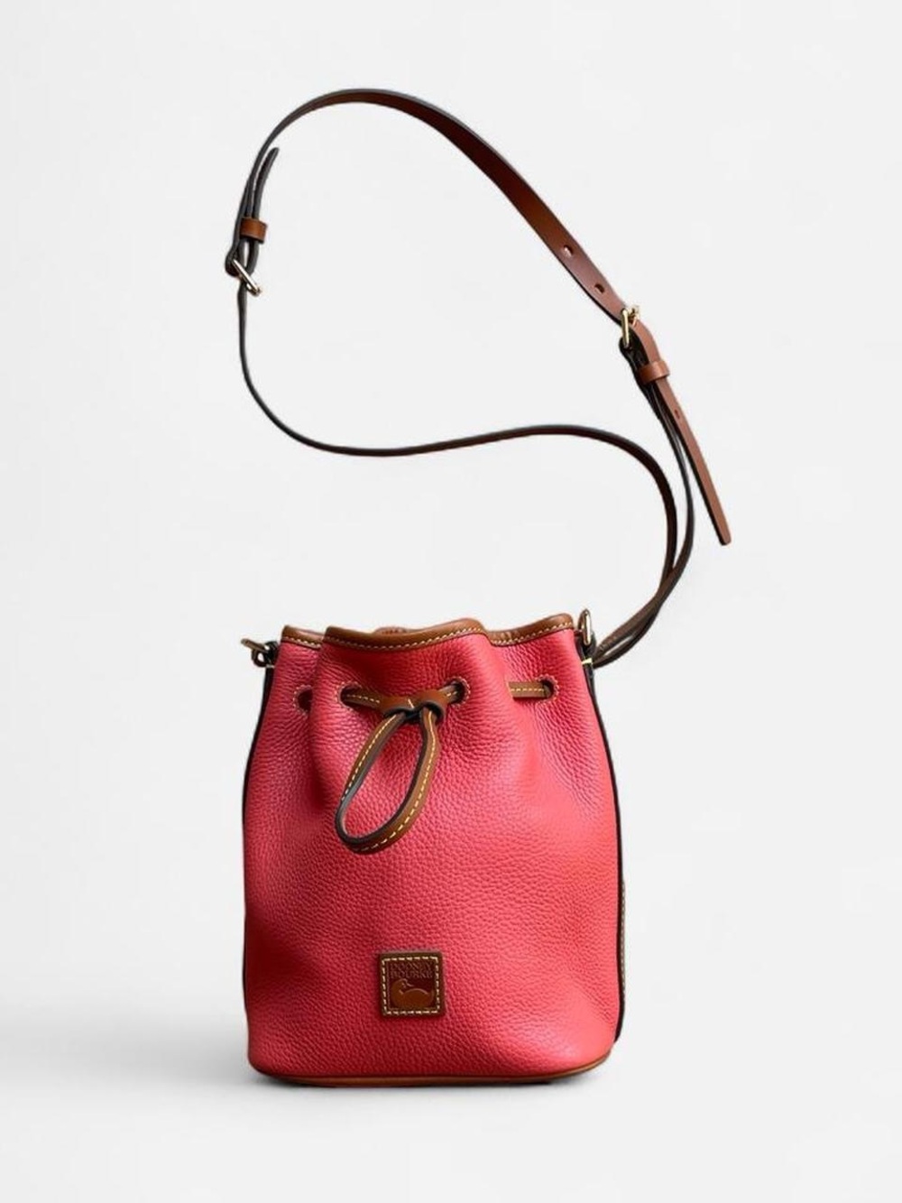 Dooney & Bourke Pink Pebble Leather Drawstring Crossbody